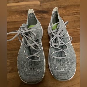 Nike grey attached tongue sneakers